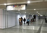 Commuters walking towards the MRT station from the link