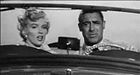 Marilyn Monroe ja Cary Grant.