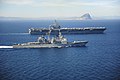 Vicksburg escorts Theodore Roosevelt past the Rock of Gibraltar, April 2015.