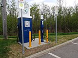 A charging site in Quebec, Canada with a 50 kW CHAdeMO / CCS "combo" DC fast charger and a Level 2 AC connector.