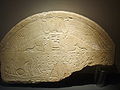 Example of Lunette with Wings, (filling the semicircle top of stele)