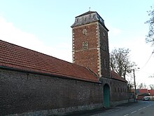 Photographie montrant le porche-pigeonnier de la ferme Valicourt