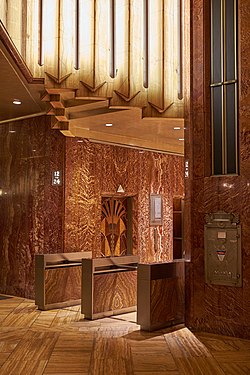 Chrysler Building lobby on 42nd street entrance, left elevator bank with art deco illumination