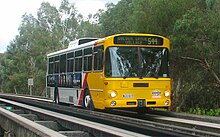 A bus on a concrete guided busway