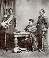 Image 36Malagasy Embassy to Europe in 1863. Left to right: Rainifiringa Ralaimaholy, Rev. John Duffus and Rasatranabo aka Rainandrianandraina. (from History of Madagascar)