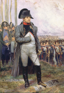 painting of Napoleon in 1806 standing with hand in vest attended by staff and Imperial guard regiment