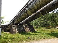 Penstocks channel water from the dam to the power station.