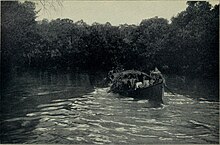 Voyage in a steel boat on the Gribingi River.jpg