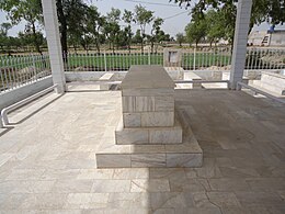 The grave of Major Tufail Muhammad Shaheed (Nishah e Haider) at his tomb in Tufailabad Graveyard.