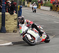 2012 Isle of Man TT  TT Zero - (2) Mark Miller Motoczysz E1pc followed by (3) John McGuinness MUGEN Shinden in a race won by Michael Rutter Motoczysz Elpc 6 June 2012 .