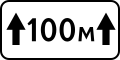 Above sign indicating a length in 100 meters