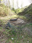 Le bouchon en béton armé est particulièrement visible.