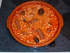 Fabada prepared in a traditional clay cazuela