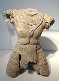 Corps d'une divinité mâle (Śiva?). Yang Mum, Gia Lai. XIVe – XVe siècle. Céramique brune. MH Vietnam