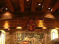 Devise de la confrérie dans le Grand Cellier du Château du Clos de Vougeot