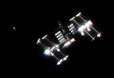 Снимка на МКС и Товарен кораб H-II, направена през телескоп от Ралф Вандеберг.