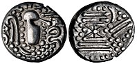 A Chaulukya-Paramara coin, circa 950-1050 CE. Stylized rendition of Chavda dynasty coins: Indo-Sassanian style bust right; pellets and ornaments around / Stylised fire altar; pellets around.[19]
