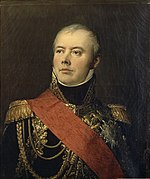 Painting shows a confident-looking man in a dark blue military uniform with lots of gold braid and a red sash across his shoulder.