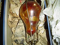 A glass grenade-style extinguisher, to be thrown into a fire