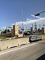 Photo showing a gate arm at the SW 200th Street intersection that will go down when a BRT vehicle is approaching, ensuring that BRT vehicles will never stop at a light.