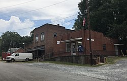 Cluster of old buildings in Moncure; post office on the right