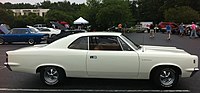 1969 base model AMC Rebel 2-door hardtop with aftermarket wheels