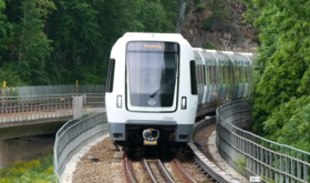 A C30 train on line 13 near Vårby Gård