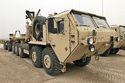 Oshkosh M1075A0 PLS truck with M1076 PLS trailer (Armor Holdings developed protection package)