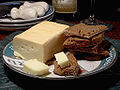 Image 5 Limburger cheese Photo credit: Jon Sullivan/Pharaoh Hound A plate of Limburger cheese and pumpernickel bread. Limburger originated from Limburg, Belgium, and is known for its strong odor, which is due in part to being fermented with the same bacteria partially responsible for human body odor. More selected pictures