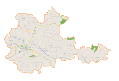 Mapa konturowa gminy Proszowice, na dole nieco na lewo znajduje się punkt z opisem „Żębocin”