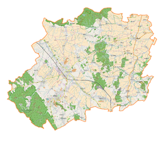 Mapa konturowa powiatu dzierżoniowskiego, blisko centrum na prawo u góry znajduje się punkt z opisem „Dwór w Sieniawce”