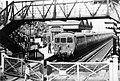 Hightown station in 1948-showing older footbridge and level crossing.