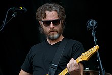 Snider performing with Minus the Bear in 2014