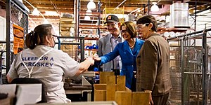 Congresswoman Pelosi greets employees of McRoskey Mattress Company, a family-owned, San Francisco mattress manufacturer founded in 1899.