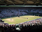 De första Wimbledonmästerskapen i tennis inleds denna dag år 1877: Centercourten i Wimbledon.