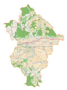 Mapa konturowa powiatu łańcuckiego, na dole znajduje się punkt z opisem „Husów”