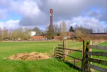 Schoorsteen van de voormalige houtfabriek Nanninga