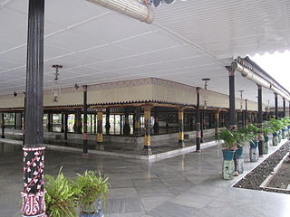 Corner of palace, with marble floor and plants