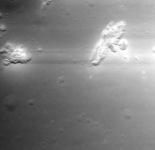 Close-up of some of the small hollows in the image to the left. Image is about 2 km wide.