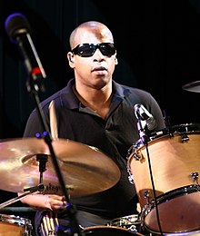 Campbell supporting the B-52s during a 2009 tour