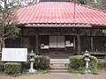 安善寺本堂と説明板（現在の本堂は京保15年（1730年）に再建）