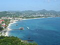 At the top of Pigeon Island, looking east towards Reduit Beach. To the left is the Landings Sandals Grande.