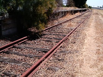 Close up view of the platform (Nov. 2009). By 2012 this track had been dismantled and replaced by a concrete footpath. (May, 2012)