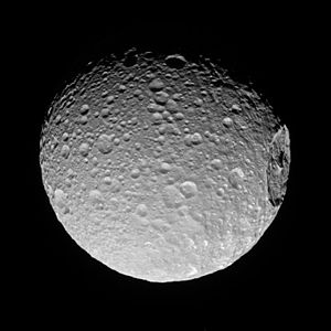 The side of Mimas that always points away from Saturn, imaged by Cassini on November 19, 2016 at a distance of 85,000 kilometers (53,000 miles).[41]