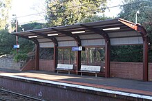 Red coloured platform shelter