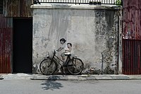 Anak-anak pada Basikal oleh Ernest Zacharevic.