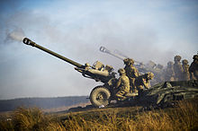 Royal Artillery Firing 105mm Light Guns MOD 45155621.jpg