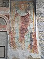 Christophorus-Fresco auf der Westfassade der Kirche St. Maria Assunta in Brione (Verzasca), Kanton Tessin, Schweiz