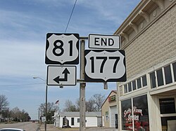 Road signs in South Haven with businesses in background (2009)