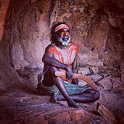 A Yuendumu man holding a boomerang, photographed in 2017 by Ed Gold